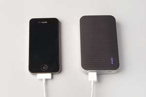 Portable Iphone 5 Charger 4000mAh Festival phone charger charging an iPhone