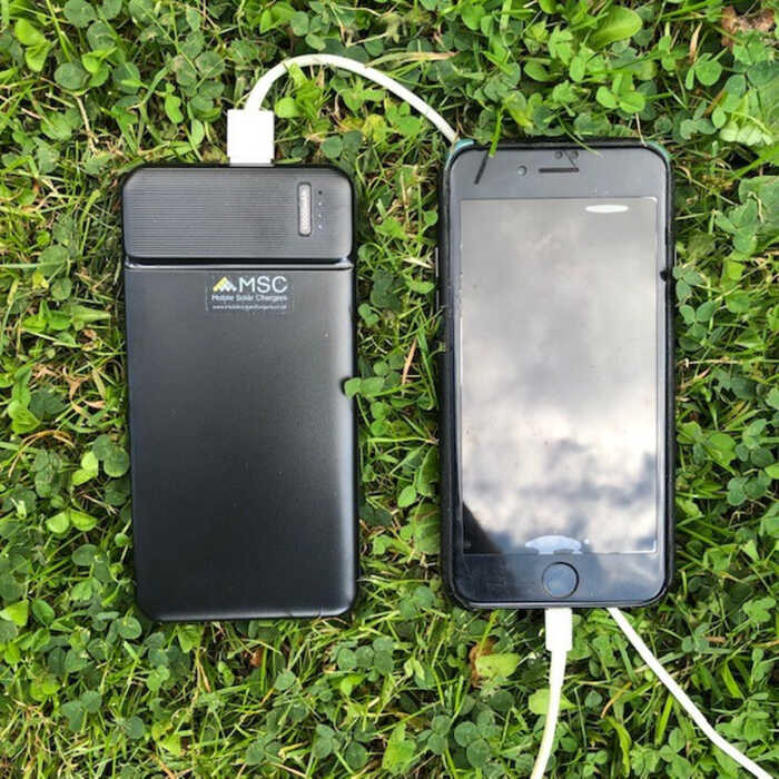 MSC Essential 10Ah portable power bank charging a phone